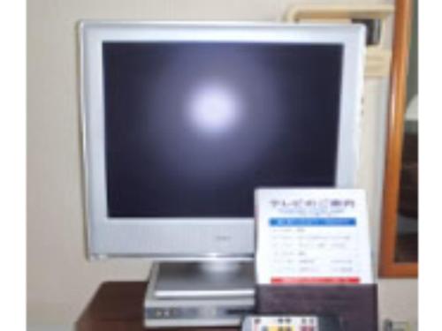 a computer monitor sitting on top of a desk at Business Hotel Heisei - Vacation STAY 90551 in Yonezawa