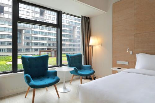 Легло или легла в стая в Haikou Meilan International Airport Hotel