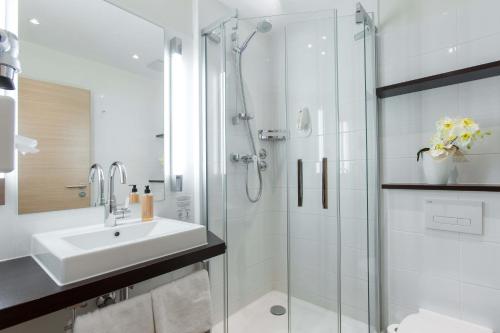 Un baño de Hotel & Living Am Wartturm - Hotel & Apartments