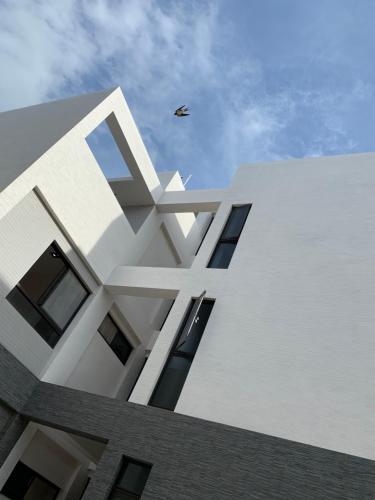 Edificio en el que se encuentra la habitación en casa particular
