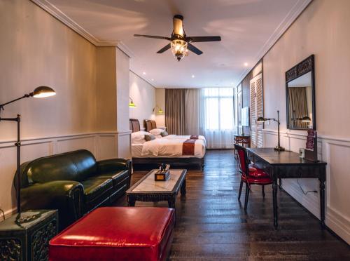 Postel nebo postele na pokoji v ubytování Guangzhou Nansha Stone Inn