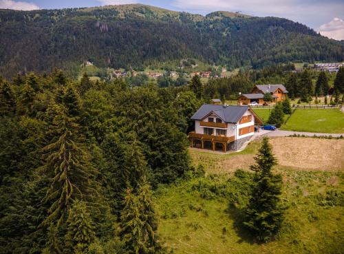 an aerial view of a house in the mountains at Vila Ambiente Donovaly in Donovaly