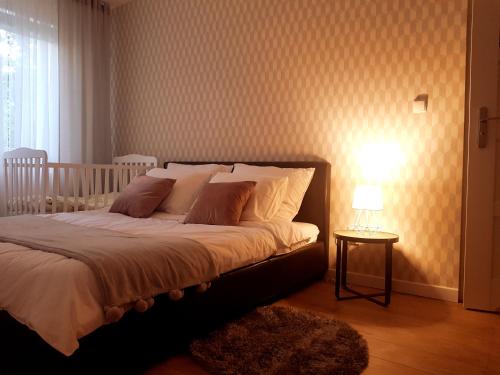 Postel nebo postele na pokoji v ubytování SUSMED Dąbki