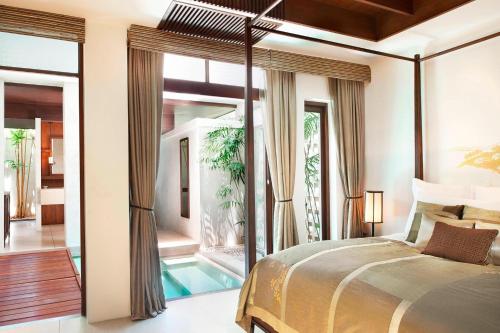 Ein Bett oder Betten in einem Zimmer der Unterkunft The Lamai Samui