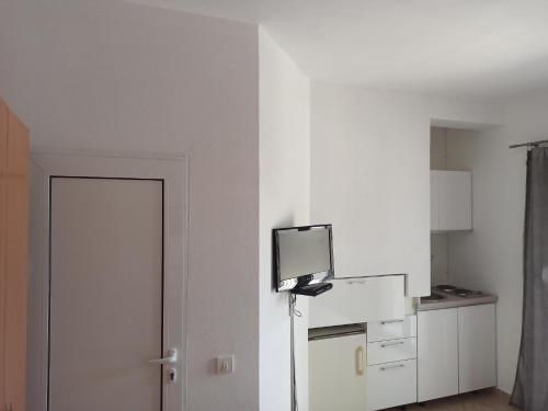 Kuchyň nebo kuchyňský kout v ubytování Apartment's Meti