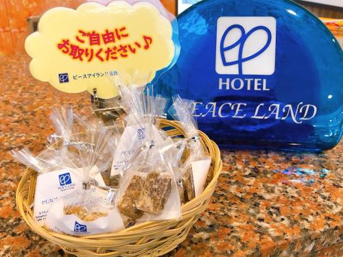 Сертификат, награда, вывеска или другой документ, выставленный в Hotel Peace Island Nago