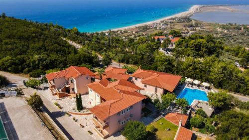 an aerial view of a house with a swimming pool at Semiramis in Lefkada