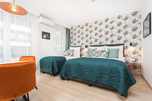 Ένα ή περισσότερα κρεβάτια σε δωμάτιο στο InPoint Apartments G11 near Old Town & Kazimierz District & Optional Paid Parking