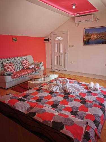 Кровать или кровати в номере Apartman Miljanović
