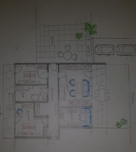 a drawing of a floor plan of a house at Exklusiv Apartment Sonnenalp in Niederau