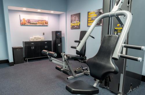 a gym with a treadmill and a tread machine at Days Inn by Wyndham Baltimore Inner Harbor in Baltimore