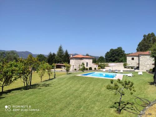 an image of a villa with a swimming pool at Casa do Pomarelho in Póvoa de Lanhoso
