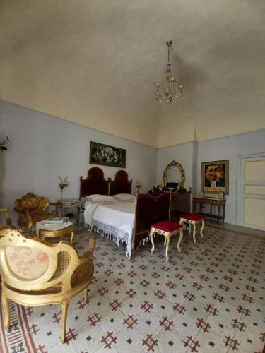 Postel nebo postele na pokoji v ubytování Suite 120