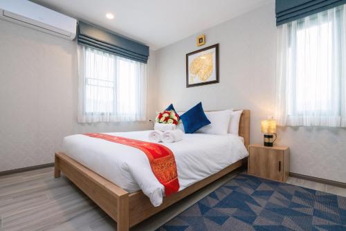 Posteľ alebo postele v izbe v ubytovaní Luxury Apartment at Title Residencies Naiyang Beach