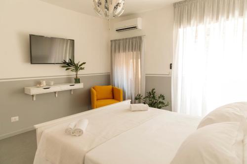 Posteľ alebo postele v izbe v ubytovaní B&B LA CUPOLA