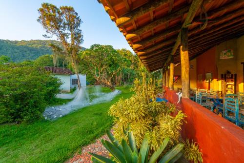 a view of a river from a house at Pousada da Rosa in Ilhabela