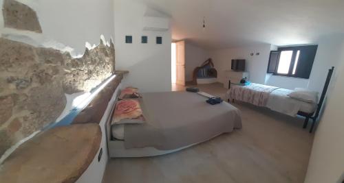 b&b il Portico Orgosoloにあるベッド