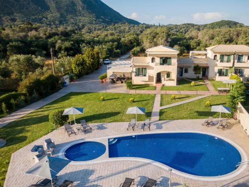 an aerial view of a villa with a swimming pool at Liostasi in Halikounas
