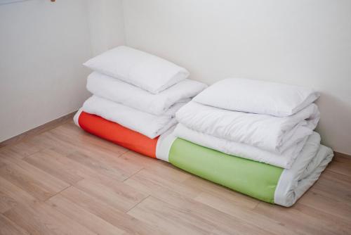 Llit o llits en una habitació de Ari House