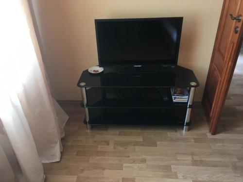 TV a/nebo společenská místnost v ubytování Apartmán PLUS KV