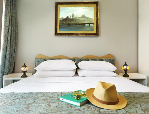 Ένα ή περισσότερα κρεβάτια σε δωμάτιο στο ELİTE HOTEL By MK
