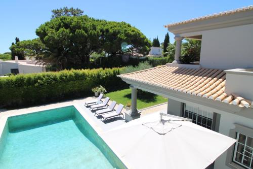 A view of the pool at Charming Exceptional Golf Villa in Algarve or nearby