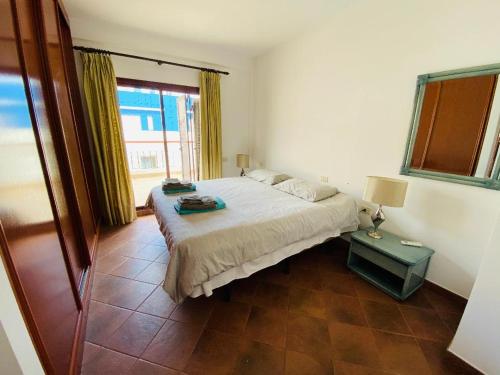 Postelja oz. postelje v sobi nastanitve luxury penthouse with ocean and beach views in Puerto de Mogan
