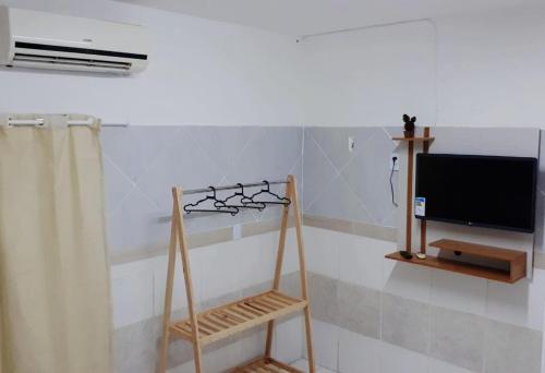 Et badeværelse på Pousada Pingo do Meio Dia