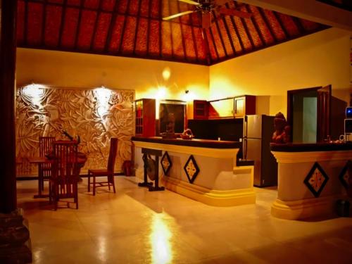 Una cocina o zona de cocina en Junjungan Suite