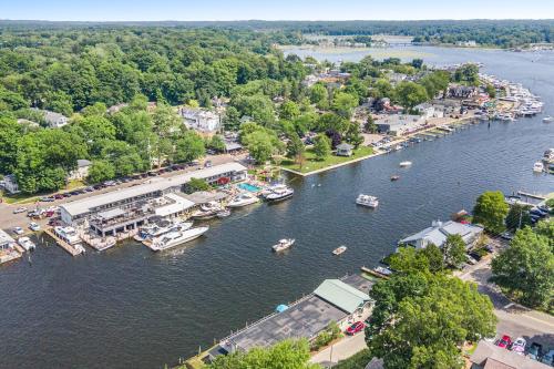 an aerial view of a marina with boats in the water at Waterside Suites in Saugatuck