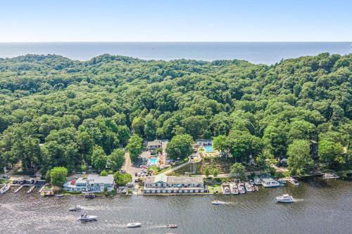 an aerial view of a resort on the water at Waterside Suites in Saugatuck