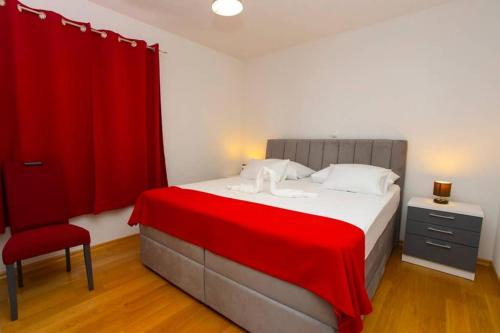 Ένα ή περισσότερα κρεβάτια σε δωμάτιο στο Apartments Vladimir #5