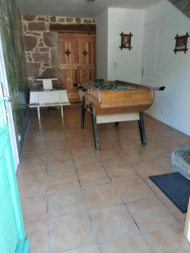 a living room with a pool table in a room at F5 à Montjaux in Montjaux