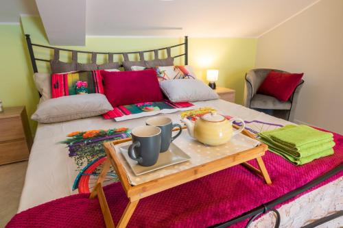 Ένα ή περισσότερα κρεβάτια σε δωμάτιο στο Masciara Home - Apartment & Suite fra Taormina, Catania ed Etna