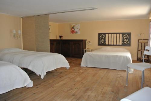 Säng eller sängar i ett rum på En Avignon