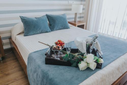 En eller flere senge i et værelse på Hotel Nossa Senhora de Lurdes
