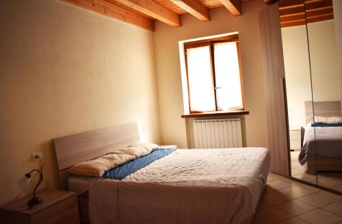Postel nebo postele na pokoji v ubytování Residence La Pineta
