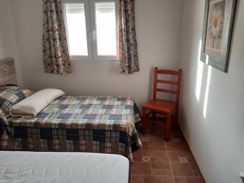Postel nebo postele na pokoji v ubytování Cortijo Oliveras Moratalla