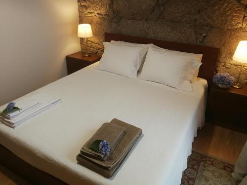 Casas Marias de Portugal - Cerveira tesisinde bir odada yatak veya yataklar