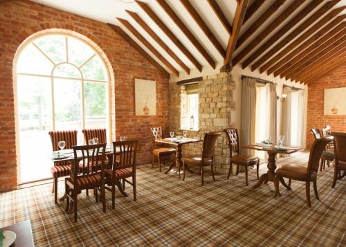 A restaurant or other place to eat at The Woodhouse Arms 