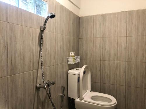 Koupelna v ubytování Bamboe Inn Homestay