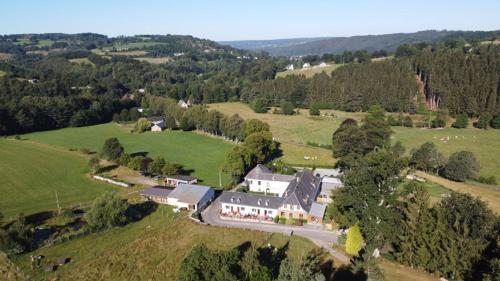 an aerial view of a large house in a field at La Source d'Arimont in Malmedy