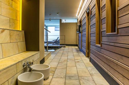 Koupelna v ubytování Apartment Enzian mit Mitbenutzung SPA & Wellness - GRIWA RENT AG