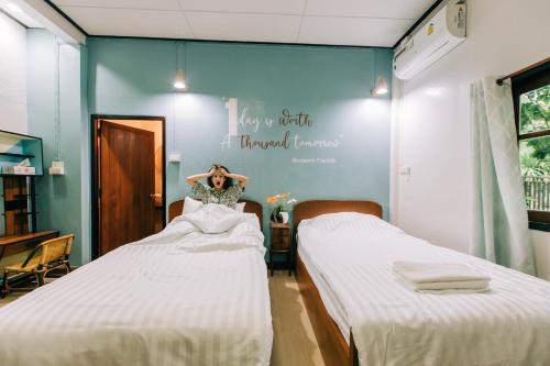 Кровать или кровати в номере Banya BnB ที่พักบ้านย่าบีแอนด์บี เมืองประจวบฯ