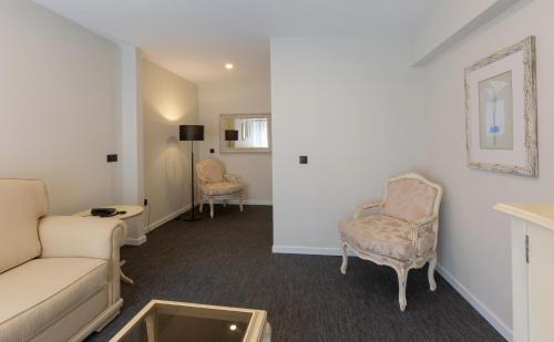 TV a/nebo společenská místnost v ubytování Hotel Afonso V & SPA