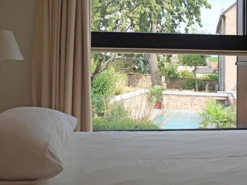 Una cama o camas en una habitación de La Bonneterie