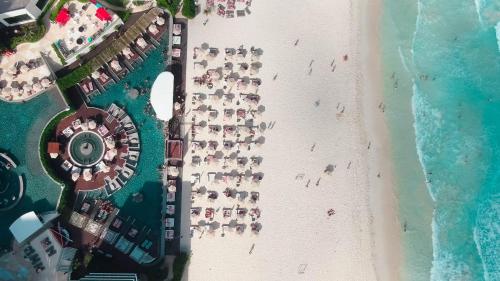 an overhead view of a beach with a group of people at Armar House, All-Inclusive in Cancún