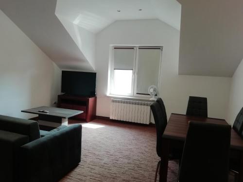 Μια τηλεόραση ή/και κέντρο ψυχαγωγίας στο APARTAMENT W CENTRUM OLESNA