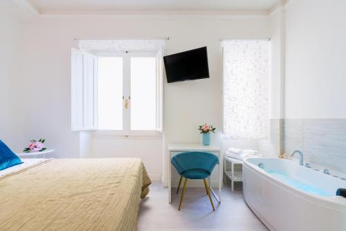 Atena Roomsにあるベッド