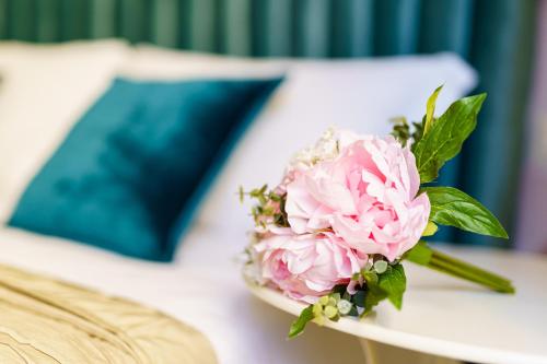 Atena Roomsにあるベッド